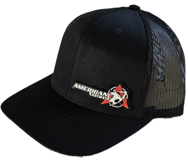 Offset side view of the American Animal Best Hat You Will Ever Own in Black with PVC logo patch at bottom left of front panel